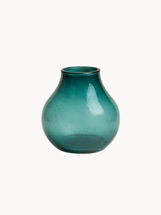 A small, translucent teal glass vase, featuring a rounded, bulbous body and a short, narrowed neck, on a plain white background.