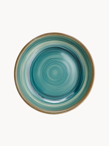 A top-down view of a round ceramic plate featuring a glossy teal and turquoise glaze with concentric swirl patterns and a brown rim.