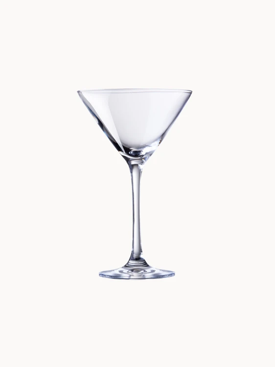 A classic, clear martini glass with a conical bowl resting on a slender stem.